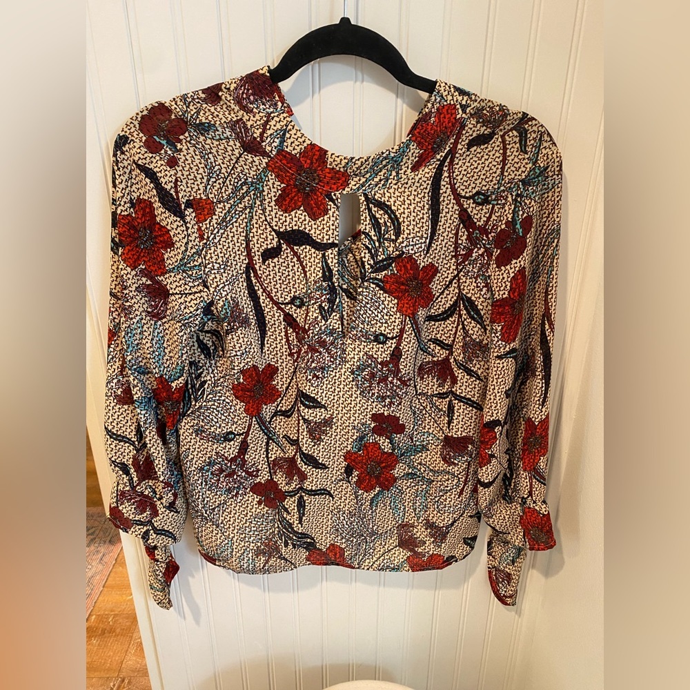 Peekaboo long sleeve floral blouse